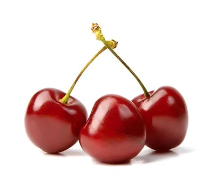 Three cherries Stock Photos