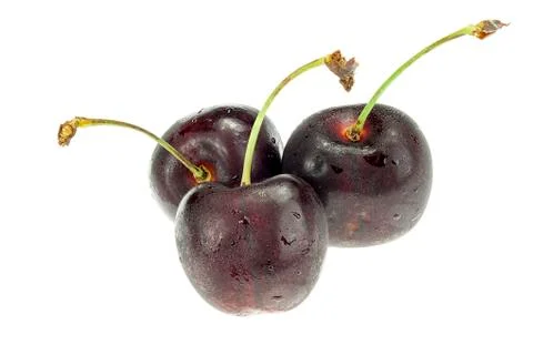 Three cherry berries isolated on white background Stock Photos