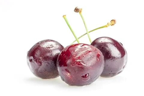 Three cherry berries isolated on white background Stock Photos