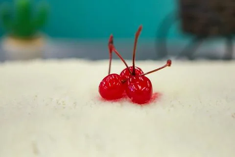 Three cherry berries in syrup Stock Photos