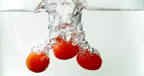 Three Cherry tomato fall in Water Super Slow Motion 스톡 동영상 247343623