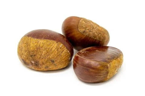 Three chestnuts isolated Stock Photos