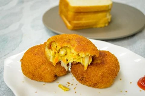 Three chicken bread cutlets Fotos Stock