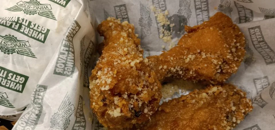 Three Chicken Drumsticks Stock Photos