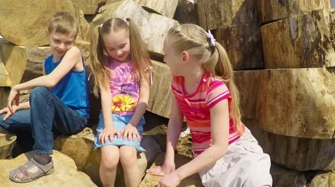 Three children 7-10 years laugh and talk Stock-Footage 50649731