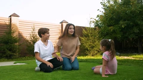 Three children play the game differently and gesture emotionally. Stock Footage 142502294