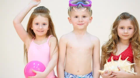 Three children staying in front of camera isolated on white Stock-Footage 22735059
