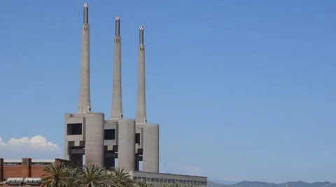 Three chimneys of the iconic power station in Barcelona Stock Footage 52822501