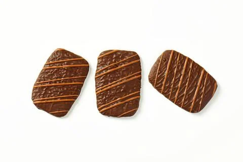 Three chocolate bars with striped pattern Stock Photos