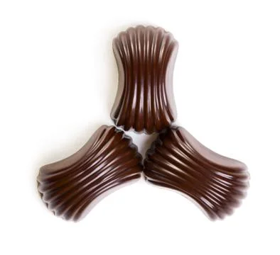 Three chocolate candies Stock Photos