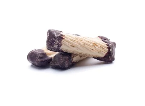 Three chocolate cookie sticks Stock Photos