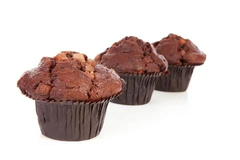 Three chocolate cupcakes Stock Photos