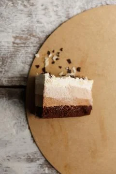 Three chocolates cake. mousse cake on a dark background. Food recipe backgrou Stock Photos