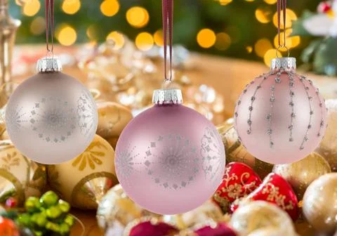 Three Christmas decorations on strings Three Christmas xmas decorations in... Stock Photos