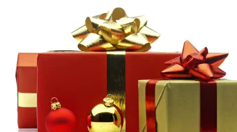 Three christmas presents on white – closer view looping Stock Footage 8952891