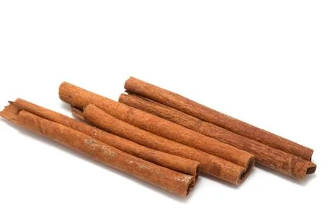 Three cinnamon sticks Stock Photos