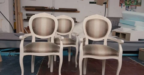 Three classic style chairs in creative workshop. Stock Footage 131744099