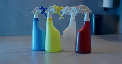 Three Cleaning Spray Bottles In Blue Yellow And Red Side By Side Stock Footage 340273096
