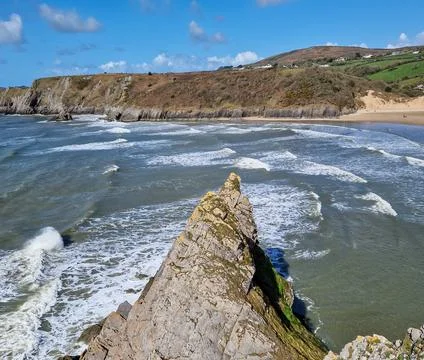 Three Cliffs Bay, a popular tourist destination located on the south coast .. Stock Photos