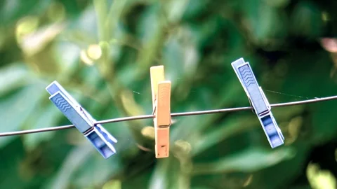 Three clothespins Stock Footage 111414129