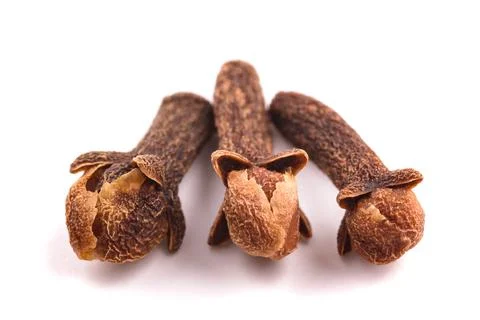 Three cloves Stock Photos