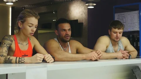 Three Coaches Communicate in the Gym Stock Footage 75352797