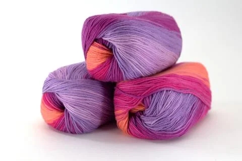 Three coils of sectional yarn for needlework on a white background Stock Photos