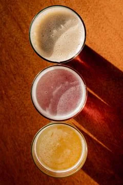 Three cold craft beers in different colors Stock Photos