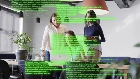 Three colleagues approaching laptop, conducting tech code review with Stock Footage 333233714