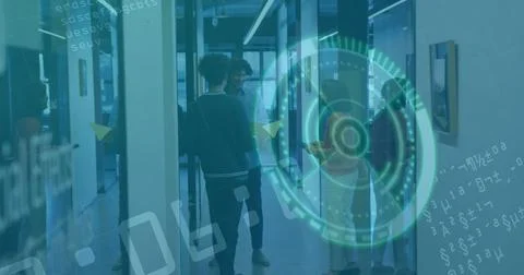 Three colleagues discussing smartphone interface graphics in office corridor, Stock Photos