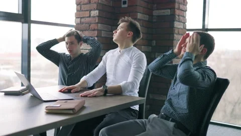 Three colleagues experiencing a loss and disappointment in their business Stock Footage 236498490