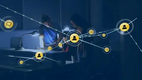 Three colleagues leaning over printer tapping tablet growing business network Stock Footage 333902488