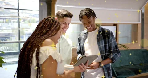 Three colleagues tapping and scrolling tablet screen, animating chart for Stock Footage 318607721