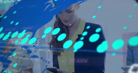 Three colleagues using smartphones in tech office, showing code snippets and Stock Footage 309285443