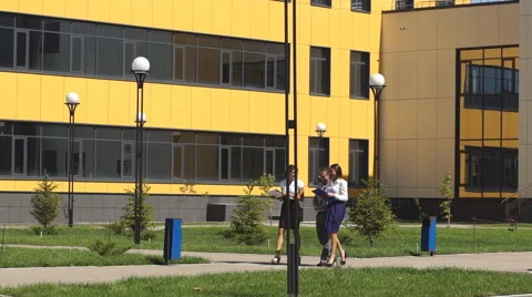 Three colleagues walk through the innovation center and communicate Stock Footage 67443339