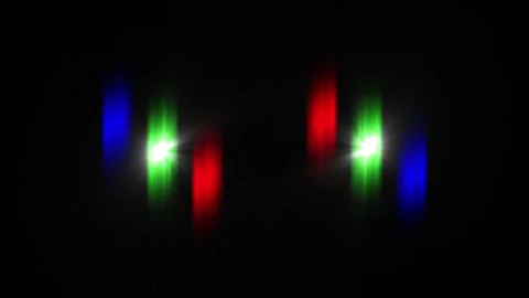 Three-color light movement in two parts facing left and right of the frame Vídeos de archivo 315518546