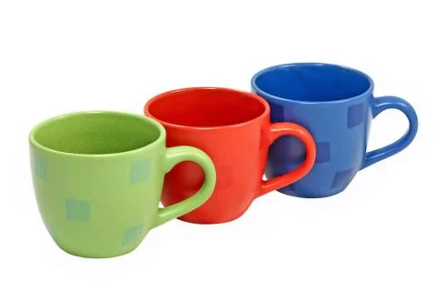 Three color tea cups.isolated. Stock Photos