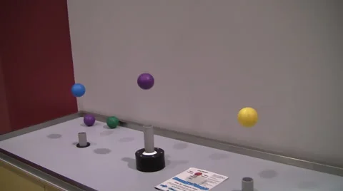 Three colored balls levitate on air Stock Footage 40729385