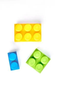Three colored constructor elements for kids. Stock Photos