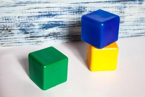 Three colored cubes Stock Photos