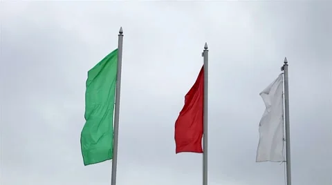 Three colored flag in the wind develops Stock Footage 8556733
