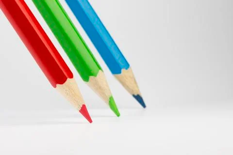 Three colored pencils in RGB colors. Stock Photos