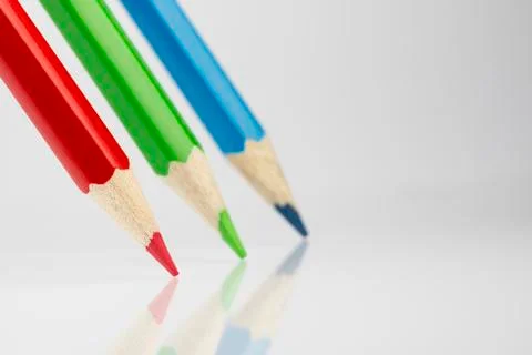 Three colored pencils in RGB colors. Stock Photos