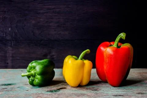 Three colored sweet pepper Stock Photos