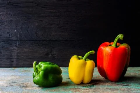 Three colored sweet pepper Stock Photos
