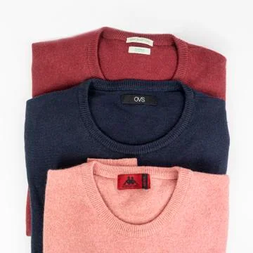 Three colored wool shirts Stock Photos