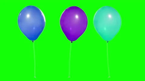 Three colorful balloons in the air. Flying balloons. Helium balloons with rope. Stock Footage