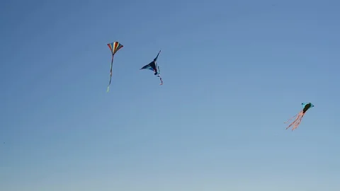 Three colorful kites in the wind Stock Footage 89622646