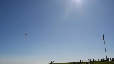 Three colorful kites in the wind Stock Footage 89622651