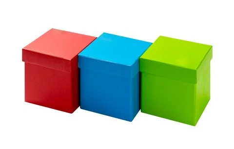 Three colorful square gift boxes of red, blue, and green on white background 写真素材
